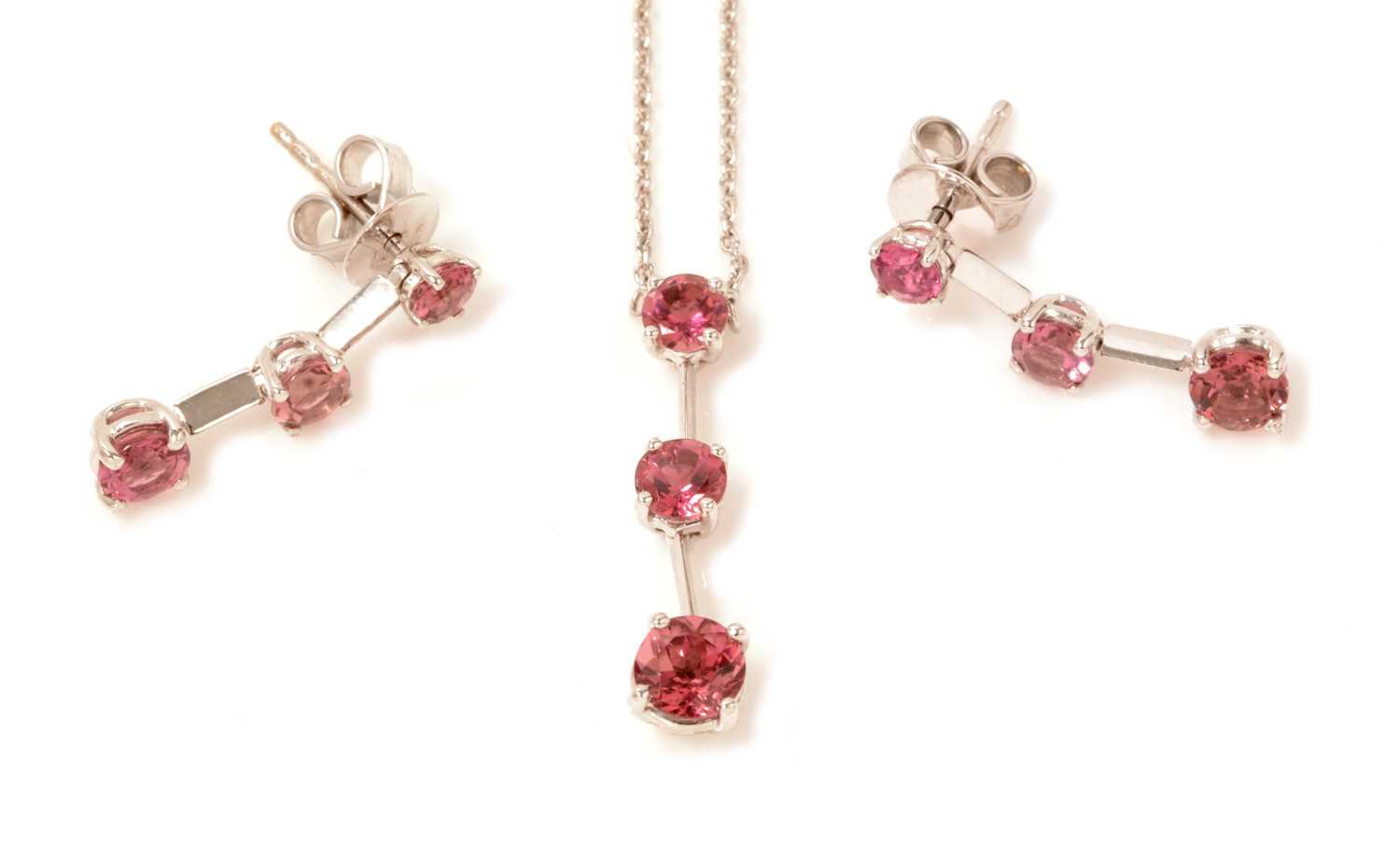 Lot 114 - A pink tourmaline pendant and earrings