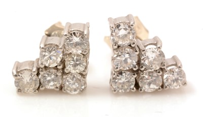 Lot 115 - A pair of diamond earrings
