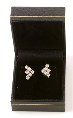 Lot 115 - A pair of diamond earrings