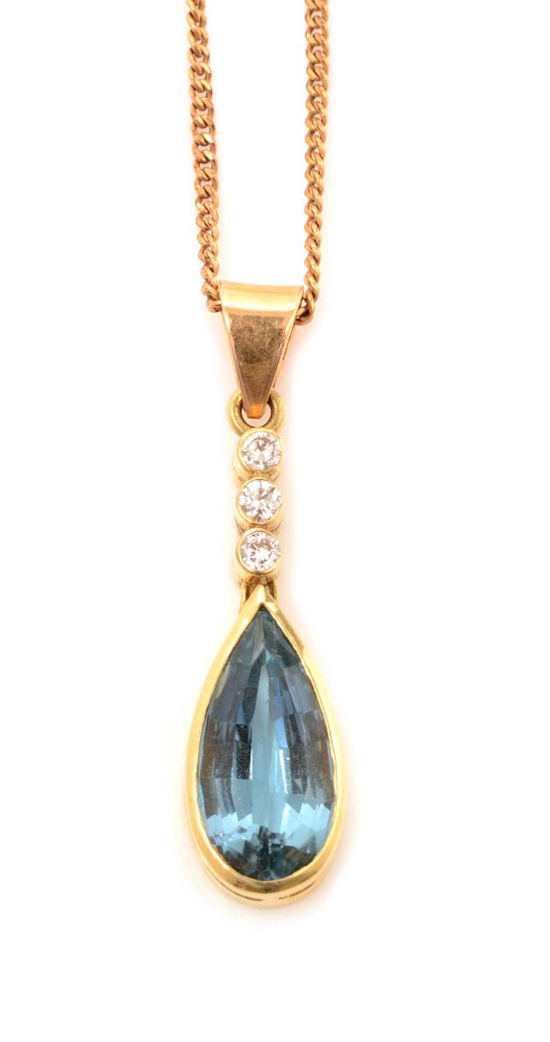 Lot 127 - A topaz and diamond pendant