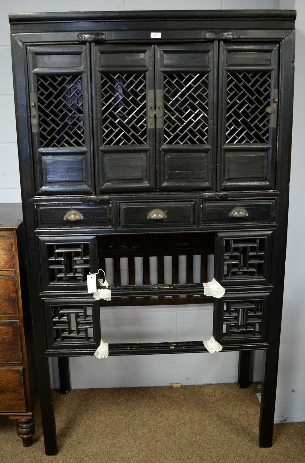 Lot 9 - A Chinese ebonised side cabinet