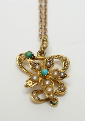 Lot 193 - An Edwardian turquoise, seed pearl, and yellow-metal pendant on chain.