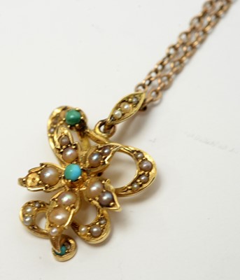Lot 193 - An Edwardian turquoise, seed pearl, and yellow-metal pendant on chain.