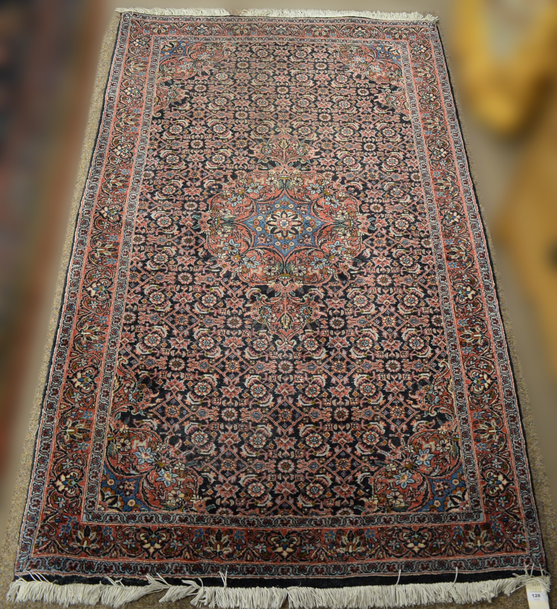 Lot 128 Modern Persian rug.