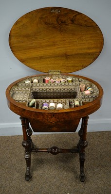 Lot 14 - A Victorian walnut work table