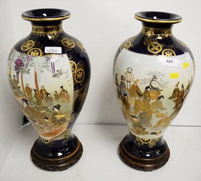 Lot 424 - A pair of Japanese Satsuma vases