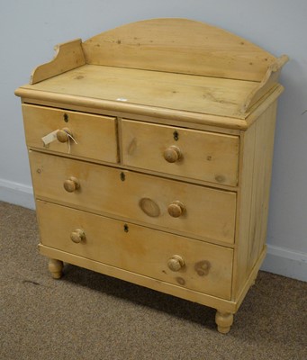 Lot 42 - A Victorian stripped pine chest of two short and two long drawers