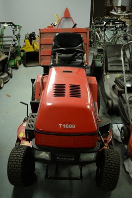 Lot 520 - A Westwood T1600 ride-on petrol lawn mower and accessories.
