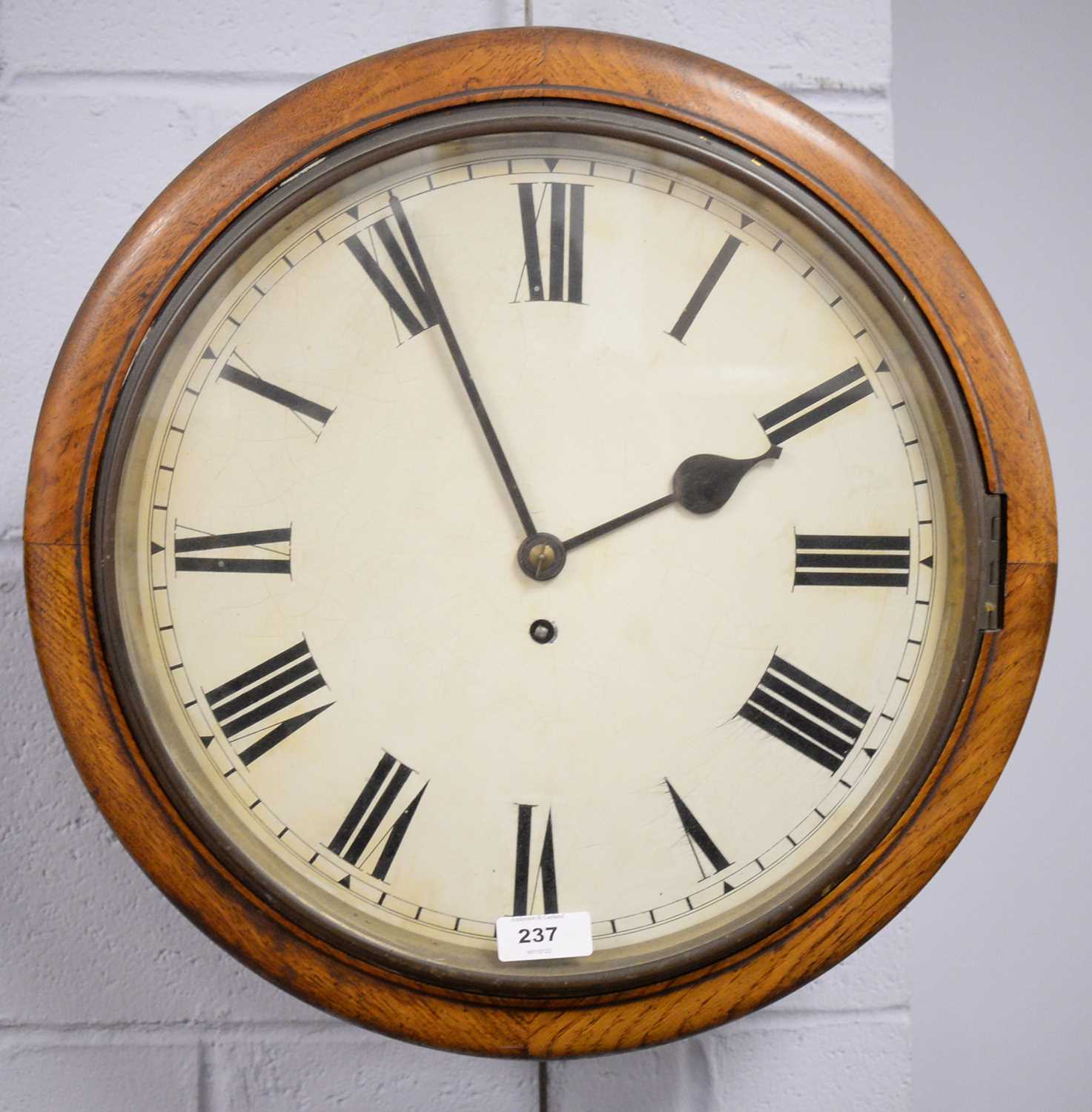 Lot 237 - An oak cased wall timepiece