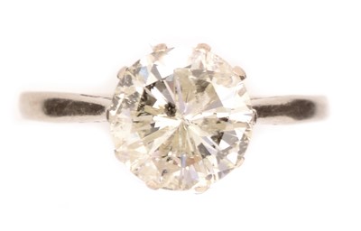 Lot 145 - A brilliant cut solitaire diamond ring.