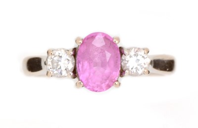 Lot 146 - A pink sapphire and diamond ring