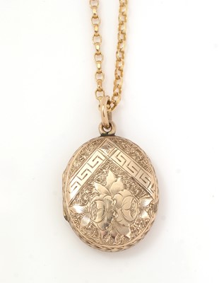 Lot 111 - A locket on a yellow metal neck chain.