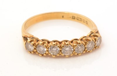 Lot 92 - A seven stone diamond ring