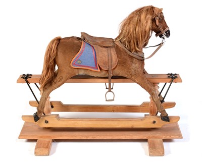 Lot 514 - A 19th Century German skin covered rocking horse