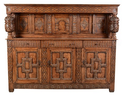 Lot 543 - A large and impressive 17th Century style carved oak court cupboard