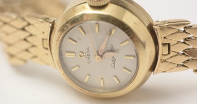 Lot 29 - An Omega 18ct yellow gold Ladymatic cocktail watch