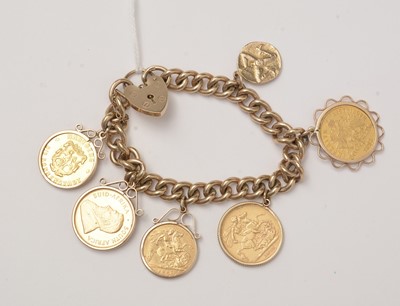 Lot 127 - A 9ct gold curb-link charm bracelet, decorated with a collection of gold coin pendants.