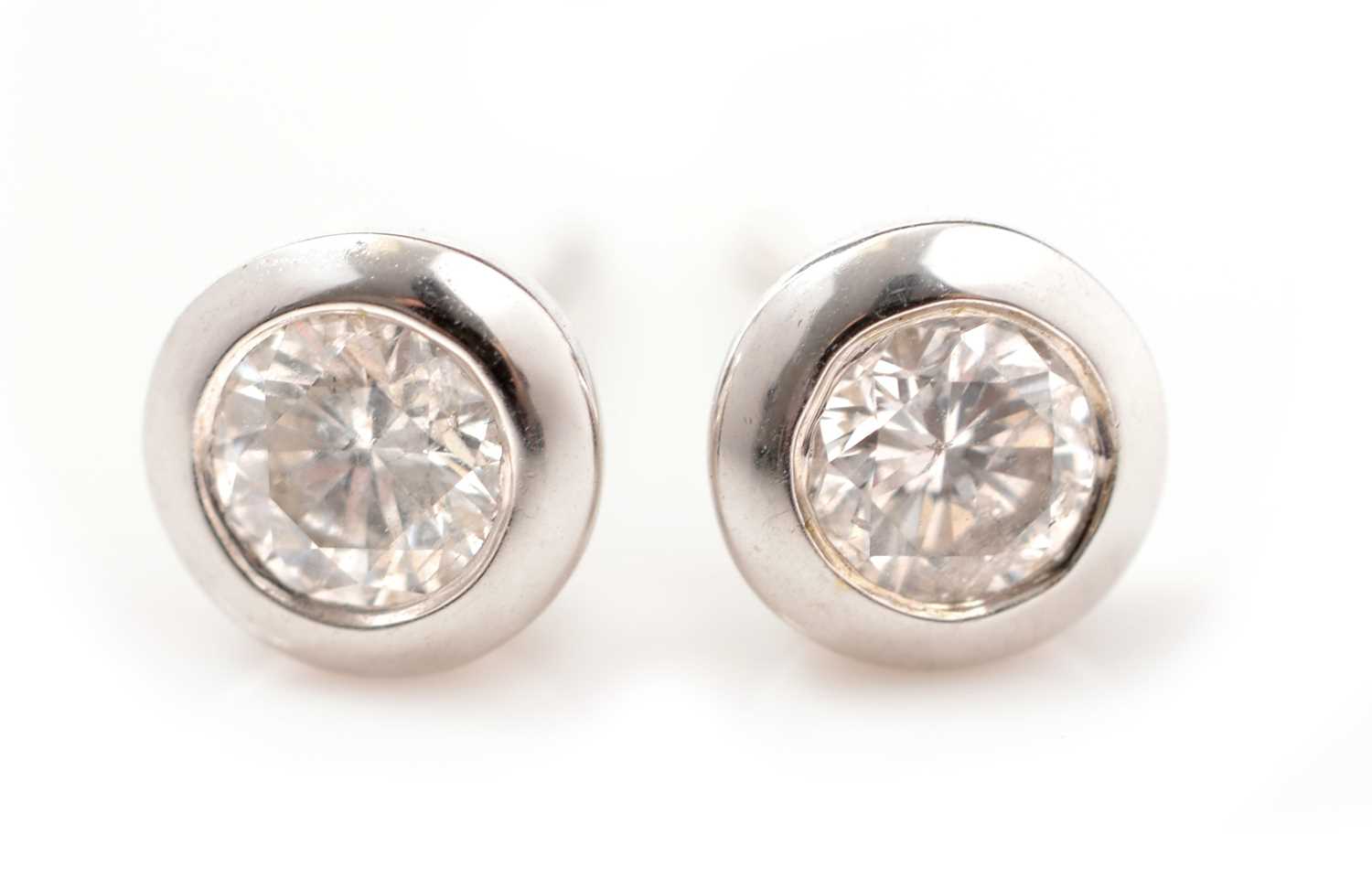 Lot 152 - A pair of diamond stud earrings