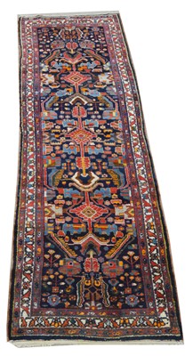 Lot 425 - A Brojerd runner, with stylized floral...