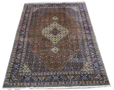 Lot 434 - A fine Tabriz carpet