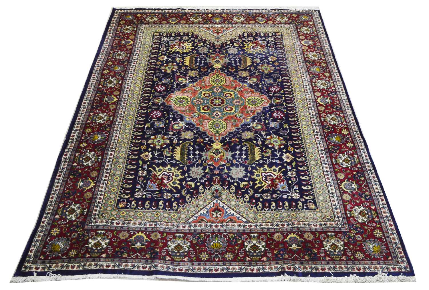 Lot 436 - A Tabriz carpet