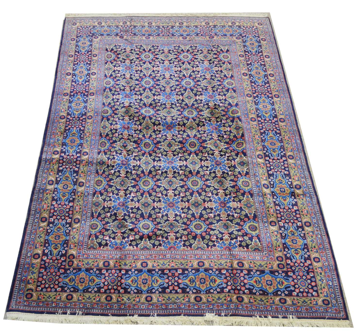 Lot 460 - A fine Hereke carpet