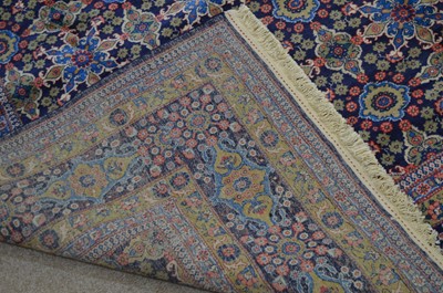 Lot 460 - A fine Hereke carpet