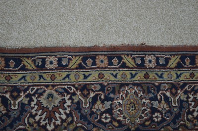 Lot 355 - A Kashan carpet