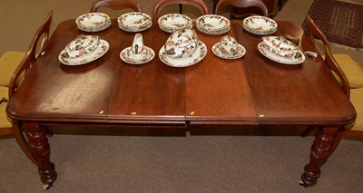 Lot 54 - A Victorian mahogany wind-out extending dining table