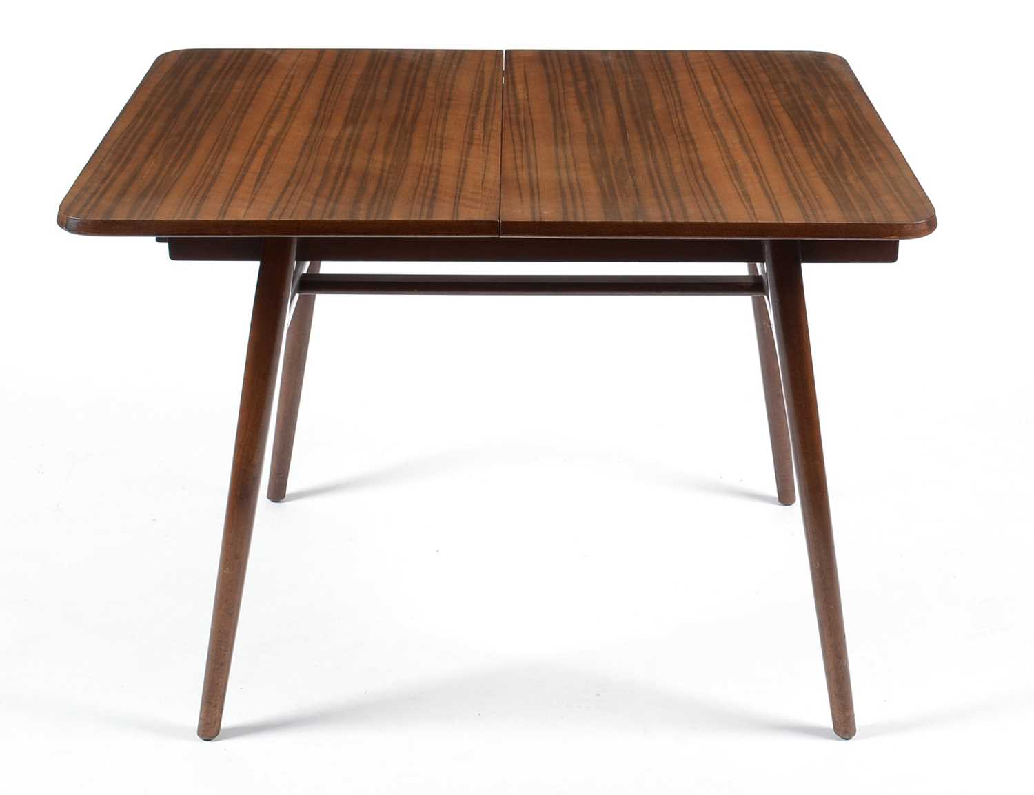 Lot 657 - Everest: a mid Century walnut extending draw leaf dining table.