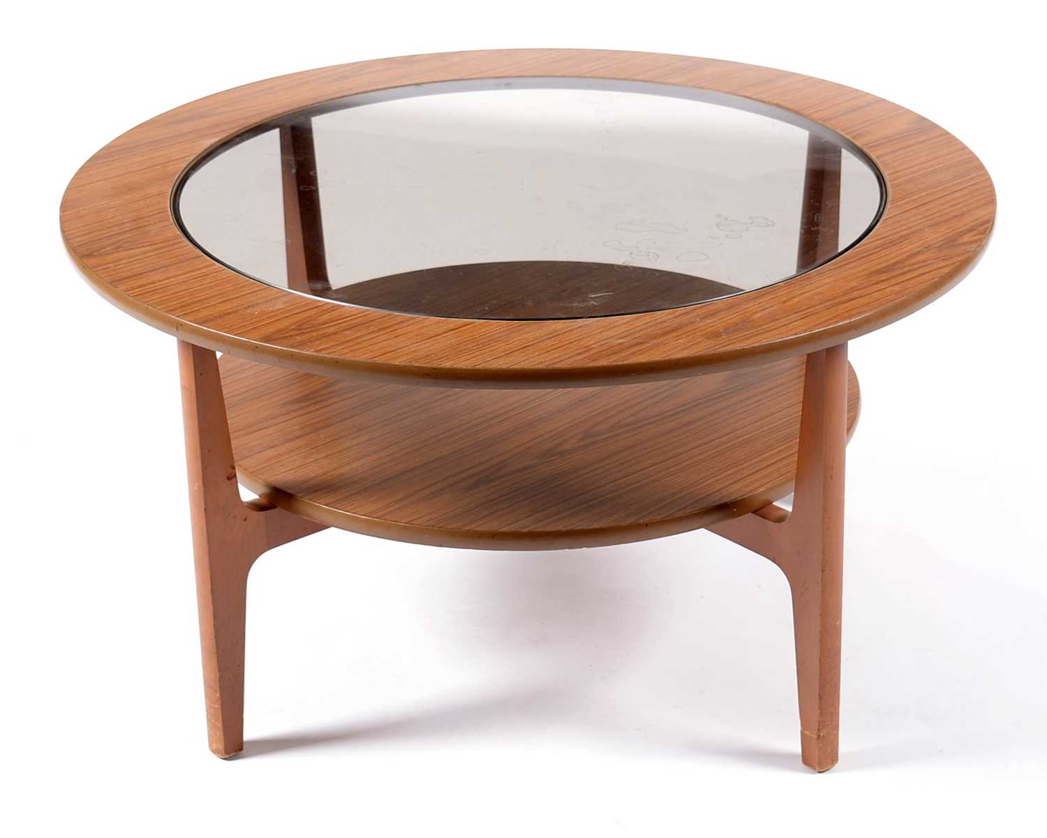 Lot 628 - Schreiber: teak veneered and glass circular coffee table.
