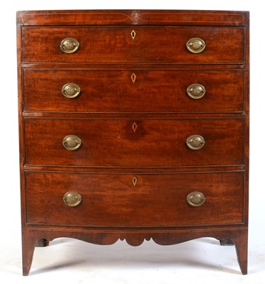 Lot 548 - A George III bowfront mahogany chest