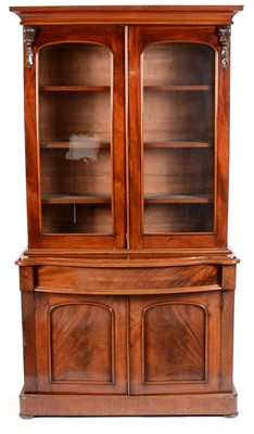 Lot 552 - A Victorian mahogany serpentine fronted bookcase