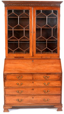 Lot 554 - A George III mahogany bureau bookcase