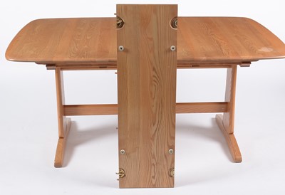 Lot 623 - Ercol: modern elm refectory style extending dining table; and four dining chairs.