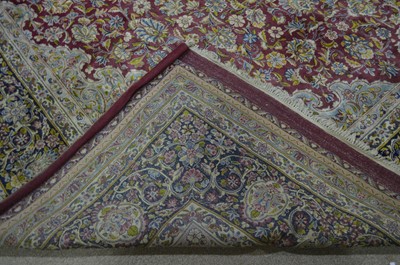 Lot 318 - A large Kirman carpet