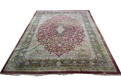 Lot 355 - A large Kirman carpet