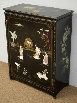 Lot 45 - A 20th Century Chinese black lacquered side cabinet