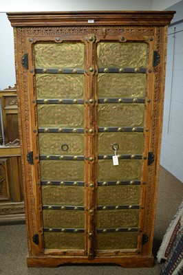 Lot 67 - A 20th Century Asian hardwood two door wardrobe