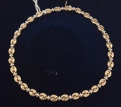Lot 128 - A 9ct gold collar necklace.