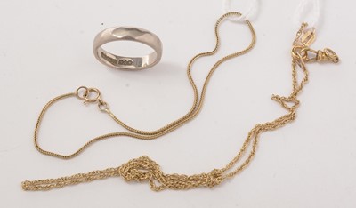 Lot 131 - An 18ct white gold wedding band, a 9ct gold necklace, and fine yellow-metal bracelet.