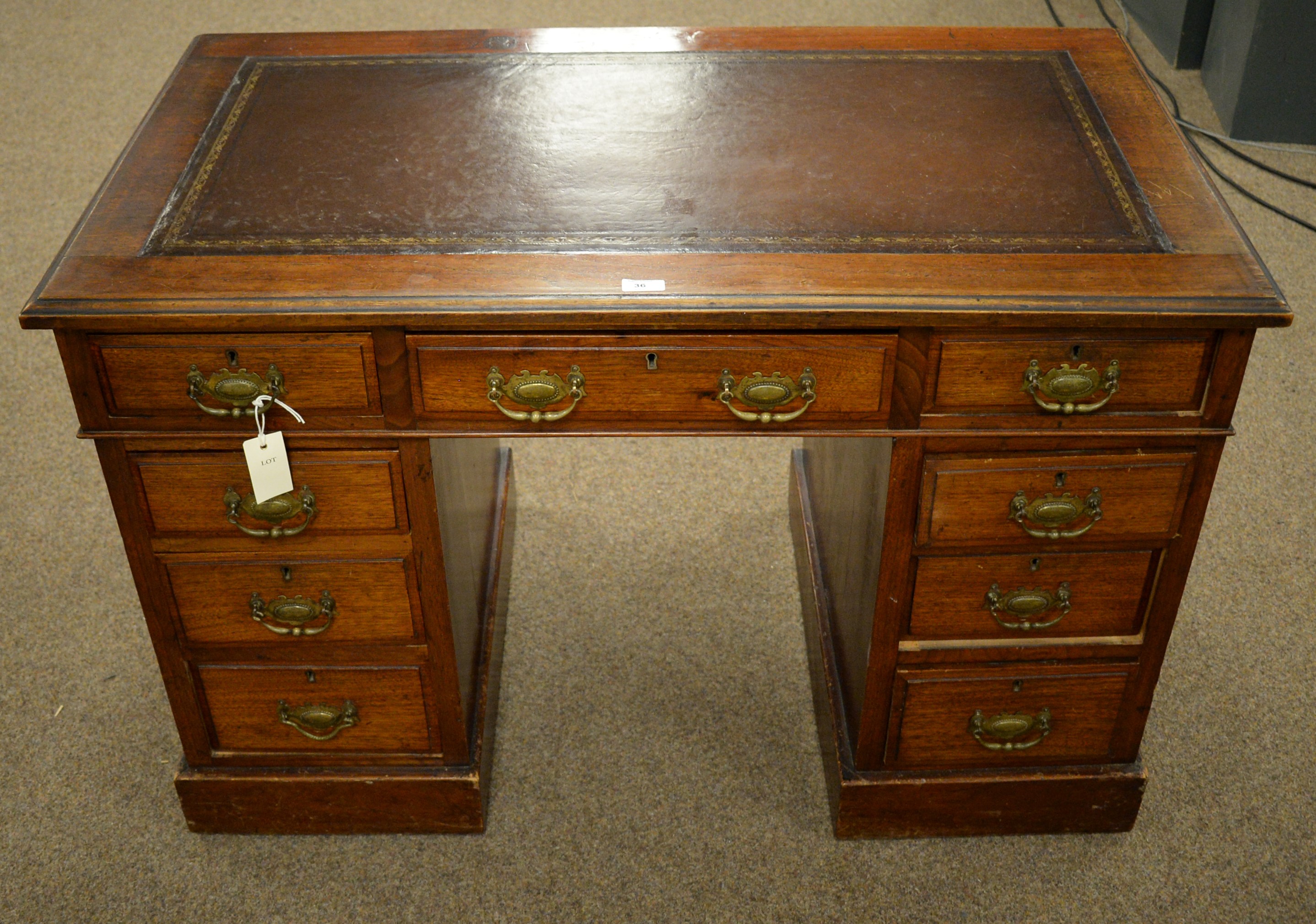 Lot 36 Edwardian pedestal writing desk