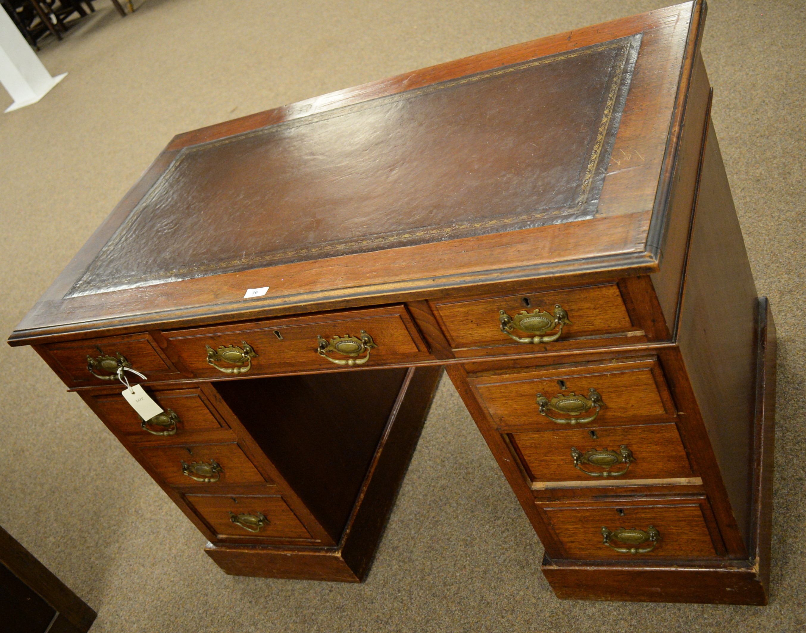 Lot 36 Edwardian pedestal writing desk