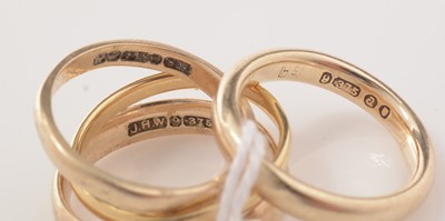 Lot 145 - Four gold wedding rings.