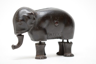 Lot 326 - Late 19th Century cast iron walking elephant toy