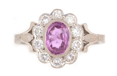 Lot 48A - A pink sapphire and diamond cluster ring