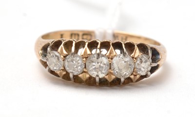 Lot 92 - An early George V five-stone diamond ring.