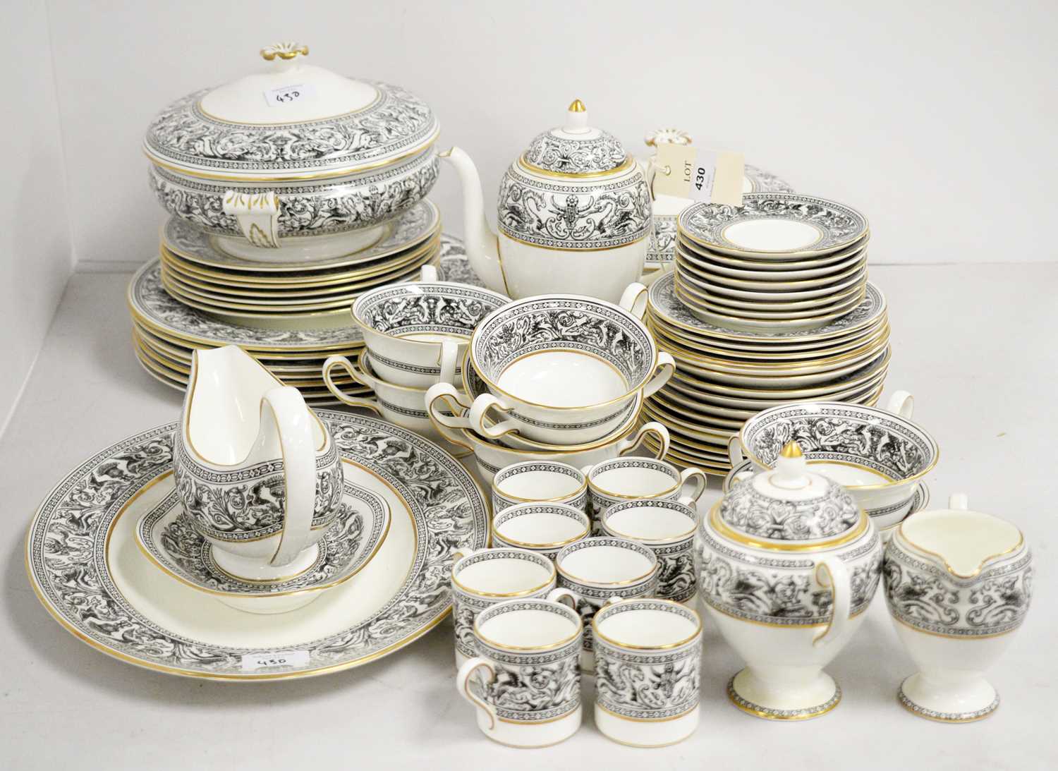 Lot 430 - A Wedgwood 'Florentine' pattern part coffee and dinner service