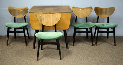 Lot 42 - A Mid Century Dining room suite.