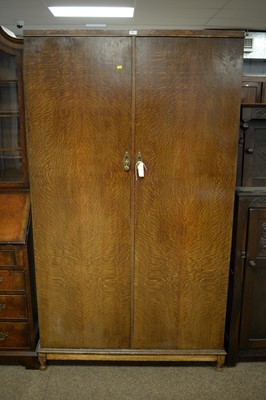 Lot 61 - An early 20th Century oak two-door compactum